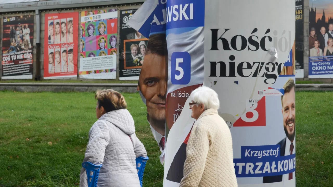 A defaced poster for a PiS candidate in Warsaw. Polandâs election campaign has been toxic, with polls indicating a tight result. Photo: Rob Picheta via CNN