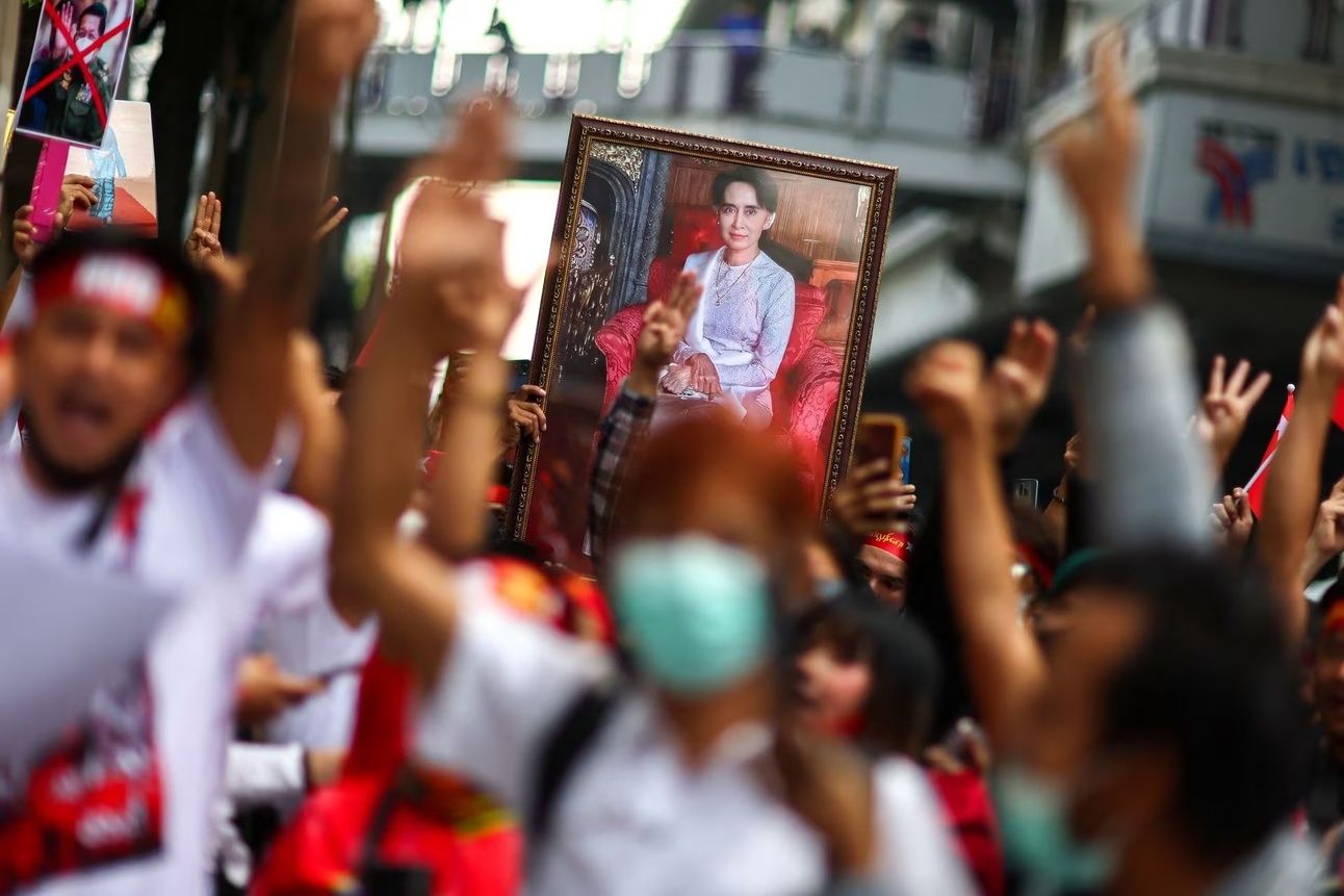 Protesters hold up a portrait of Aung San Suu Kyi during a demonstration last year outside the Embassy of Myanmar in Bangkok. Photo: Athit Perawongmetha/Reuters