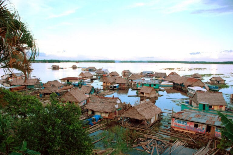 A floating village in the Peruvian Amazon. Photo via Wikimedia