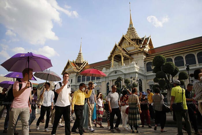 Tourists at Bangkok’s Temple of the Emerald Buddha. Photo: Wichan Charoenkiatpakul